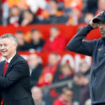 Manchester United caretaker manager Ole Gunnar Solskjaer (left) and Liverpool manager Jurgen Klopp react from the touchline during the Premier League match at Old Trafford, Manchester.