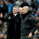 Manchester United manager Ole Gunnar Solskjaer (left) and Manchester City manager Pep Guardiola (right) enjoy a laugh on the touchline during the Premier League match at the Etihad Stadium, Manchester.