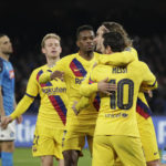 Barcelona's Antoine Griezmann, right, is hugged by teammate Barcelona's Lionel Messi after scoring in the Champions League