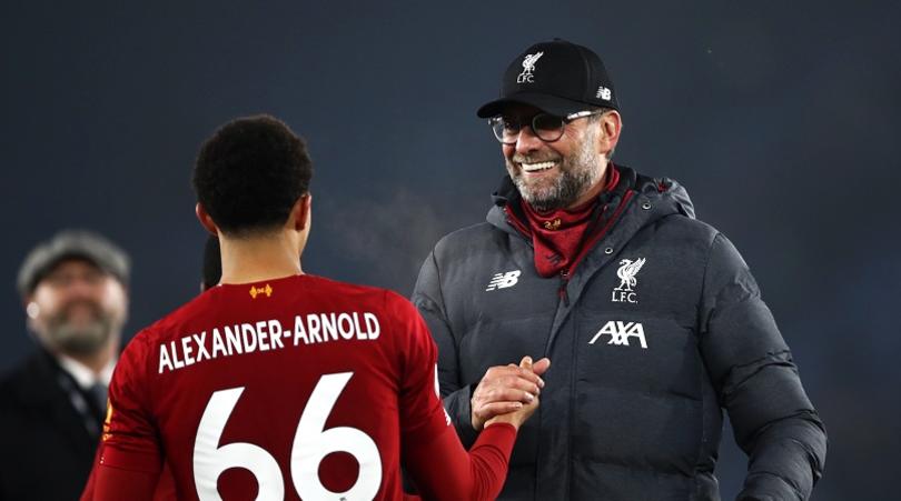 Liverpool manager Jurgen Klopp celebrates victory with Trent Alexander-Arnold after the Premier League match at the King Power Stadium, Leicester.