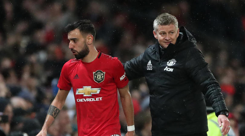 Manchester United's Bruno Fernandes and manager Ole Gunnar Solskjaer