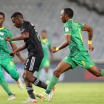 Collins Makgaka of Orlando Pirates challenged by Athinkosi Dlala and Sekela Sithole of Baroka