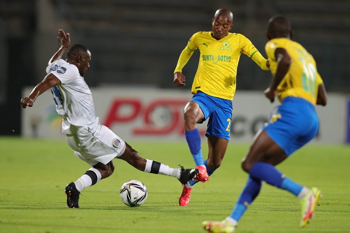 Thapelo Morena of Mamelodi Sundowns tackled by Onismor Bhasera of Supersport United