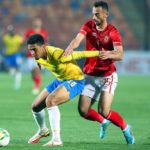 Al Ahly's Ahmed Abdelkader in action against Mamelodi's Rushine De Reuck during the CAF Champions League group A clash