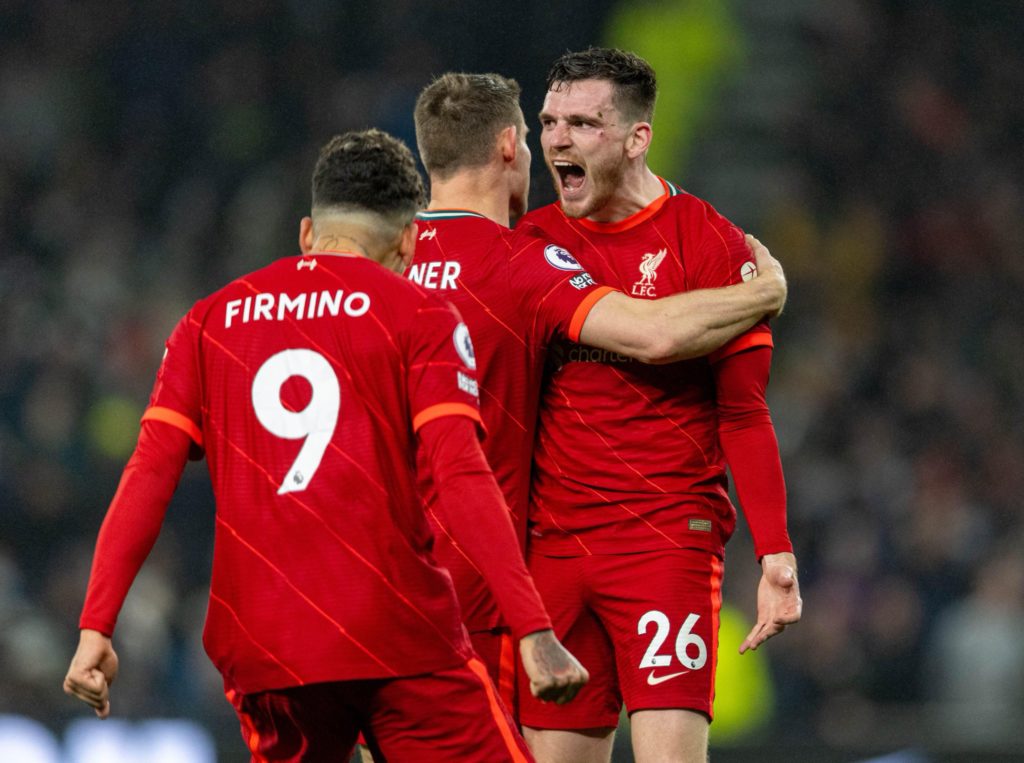 Liverpool overcome Everton battle to keep pressure on Man City