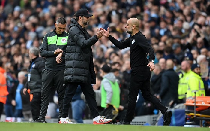 Jurgen Klopp of Liverpool and Pep Guardiola of Manchester City