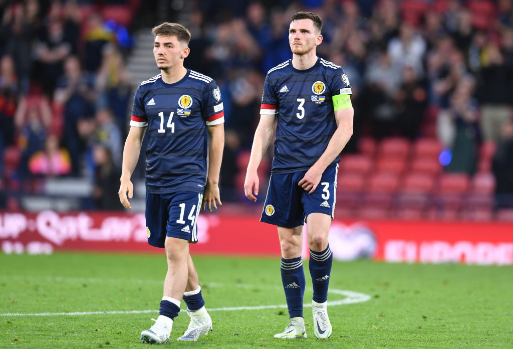 GLASGOW, SCOTLAND - JUNE 01: Billy Gilmour (L), and Andy Robertson of Scotland at the final whistle by head coach Olexandr Petrakov during the FIFA World Cup Qualifier between Scotland and Ukraine at Hampden Park on June 1, 2022 in Glasgow, Scotland. (Photo by Mark Runnacles/Getty Images)