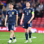 GLASGOW, SCOTLAND - JUNE 01: Billy Gilmour (L), and Andy Robertson of Scotland at the final whistle by head coach Olexandr Petrakov during the FIFA World Cup Qualifier between Scotland and Ukraine at Hampden Park on June 1, 2022 in Glasgow, Scotland. (Photo by Mark Runnacles/Getty Images)