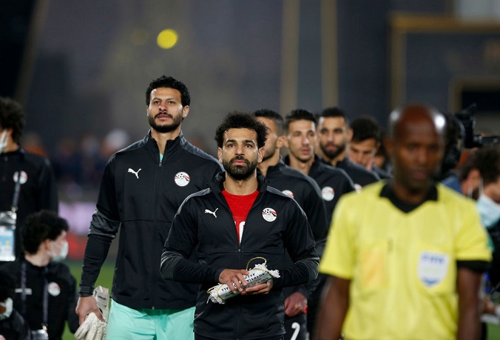 CAIRO, EGYPT - MARCH 25: Mohamed Salah of Egypt leads out his side prior to the FIFA World Cup Qatar 2022 qualification match between Egypt and Senegal at Cairo International Stadium on March 25, 2022 in Cairo, Egypt. (Photo by Mohamed Hossam/Getty Images)