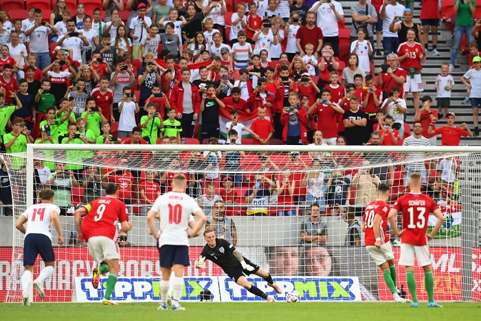 Jordan Pickford of England fails to save a penalty from Dominik Szoboszlai of Hungary as they score their team's first goal during the UEFA Nations League League A Group 3 match between Hungary and England at Puskas Arena on June 04, 2022 in Budapest, Hungary. (Photo by Michael Regan/Getty Images)