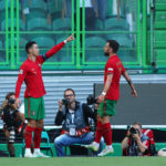 Cristiano Ronaldo of Portugal celebrates with team mate Bruno Fernandes after scoring their sides third goal during the UEFA Nations League League A Group 2 match between Portugal and Switzerland at Estadio Jose Alvalade on June 05, 2022 in Lisbon, Portugal. (Photo by Carlos Rodrigues/Getty Images)