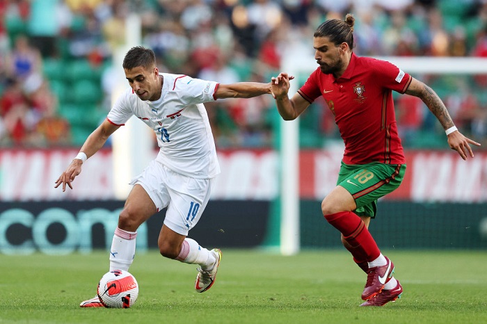 LISBON, PORTUGAL - JUNE 09: Ondrej Lingr of Czech Republic is challenged by Ruben Neves of Portugal during the UEFA Nations League League A Group 2 match between Portugal and Czech Republic at Estadio Jose Alvalade on June 09, 2022 in Lisbon, Portugal. (Photo by Carlos Rodrigues/Getty Images)