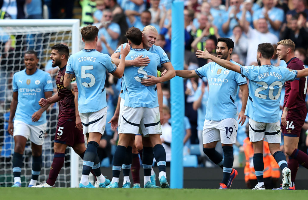 Haaland treble fires Man City to top of the table