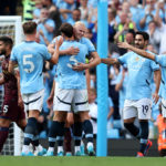 Haaland treble fires Man City to top of the table