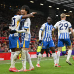 MANCHESTER, ENGLAND - JANUARY 19: Kaoru Mitoma of Brighton & Hove Albion celebrates scoring his team's second goal with teammate Pervis Estupinan during the Premier League match between Manchester United FC and Brighton & Hove Albion FC at Old Trafford on January 19, 2025 in Manchester, England.