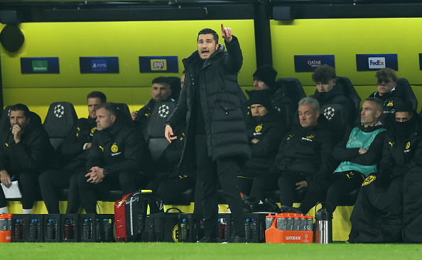 DORTMUND, GERMANY - DECEMBER 11: Nuri Sahin, Head Coach of Borussia Dortmund, reactsduring the UEFA Champions League 2024/25 League Phase MD2 match between Borussia Dortmund and FC Barcelona at BVB Stadion Dortmund on December 11, 2024 in Dortmund, Germany. (Photo by Lars Baron/Getty Images)